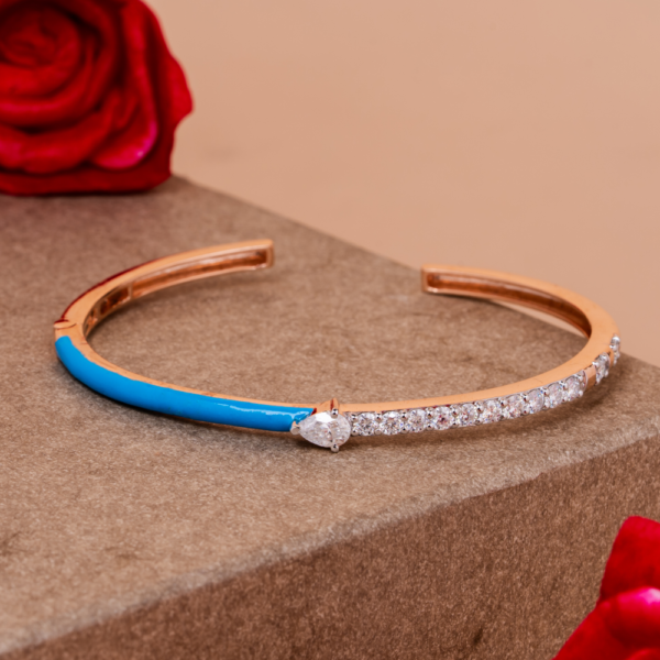 Open cuff bracelet with turquoise enamel and crystal detailing