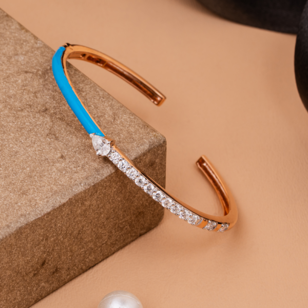 Open cuff bracelet with turquoise enamel and crystal detailing