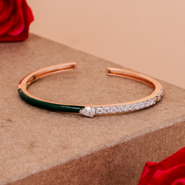Open cuff bracelet with emerald enamel and crystal detailing