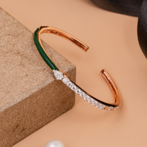 Open cuff bracelet with emerald enamel and crystal detailing