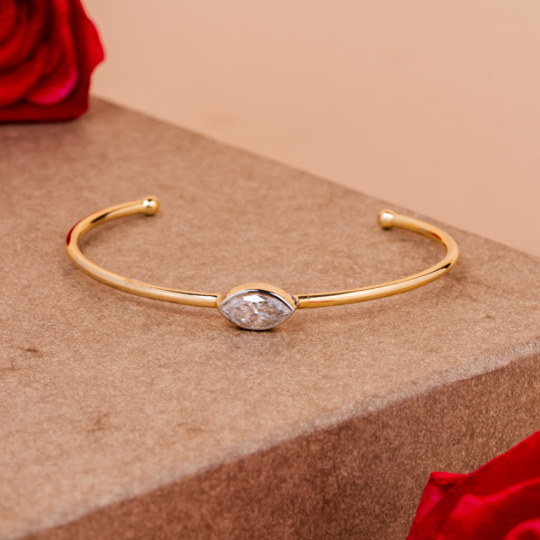 Minimal open bracelet with marquise-cut crystal centerpiece