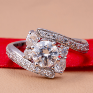 Rose gold ring with luminous opal gemstones and star engravings for a celestial-inspired design