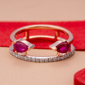 Teardrop-shaped diamond ring with sleek rose gold band