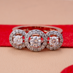 Rose gold ring featuring a central oval green gemstone surrounded by a halo of diamonds for royal elegance