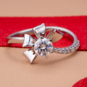 Elegant silver diamond ring with floral petal-inspired setting and sparkling solitaire centerpiece