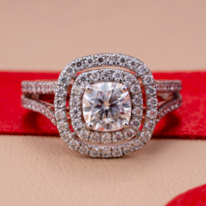 Rose gold three-stone diamond ring with round-cut diamonds framed by halos symbolizing timeless love