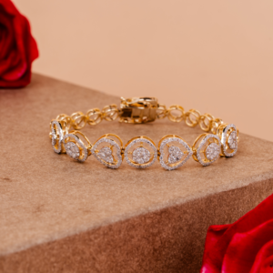 Sophisticated yellow gold tennis bracelet adorned with brilliant round-cut diamonds arranged in a continuous line, reflecting timeless luxury